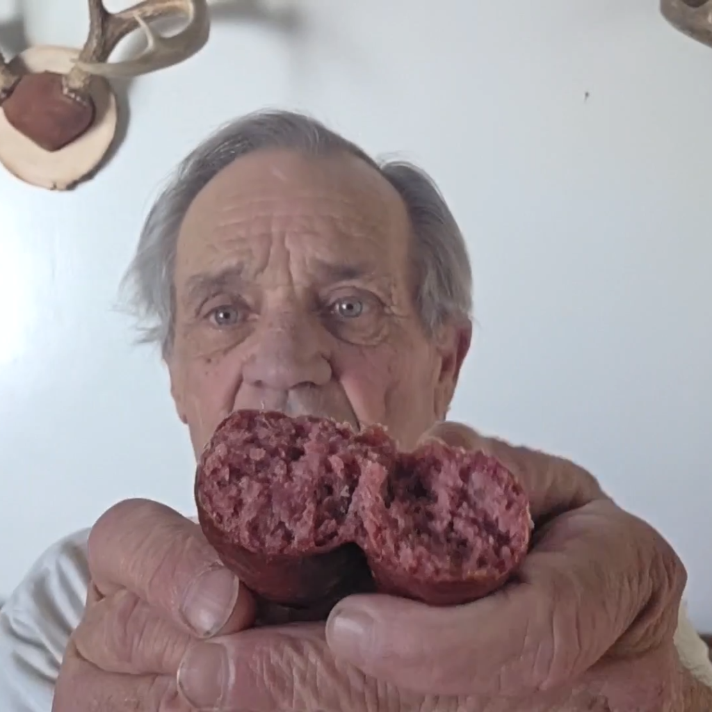 close up of a sausage broke open
