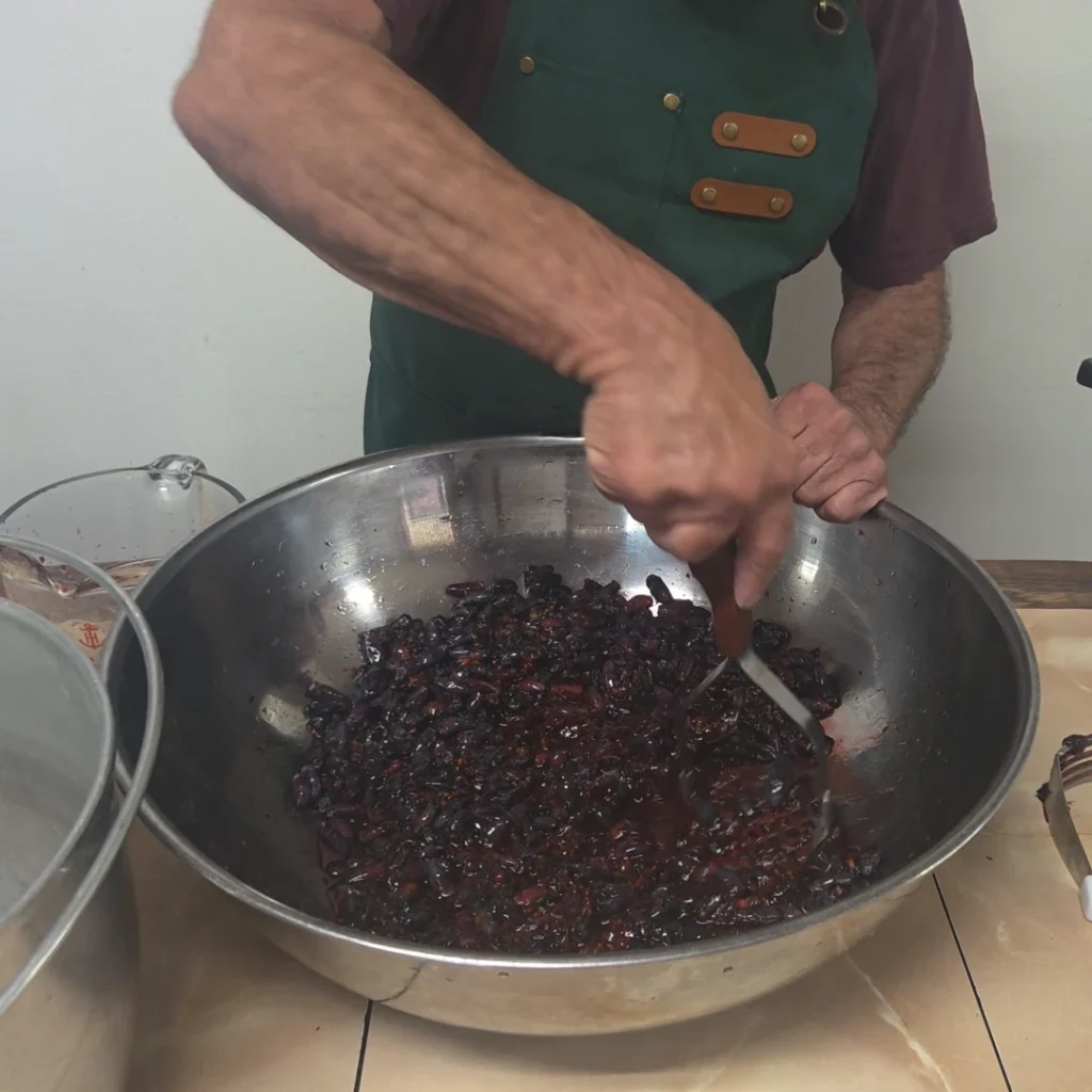 Crushing the honey Berries