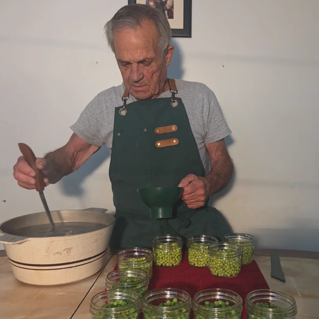 Filling the  jars for canning