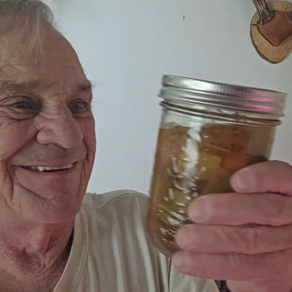 Holding a jar of stew