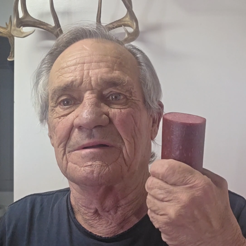 A piece of cut open salami