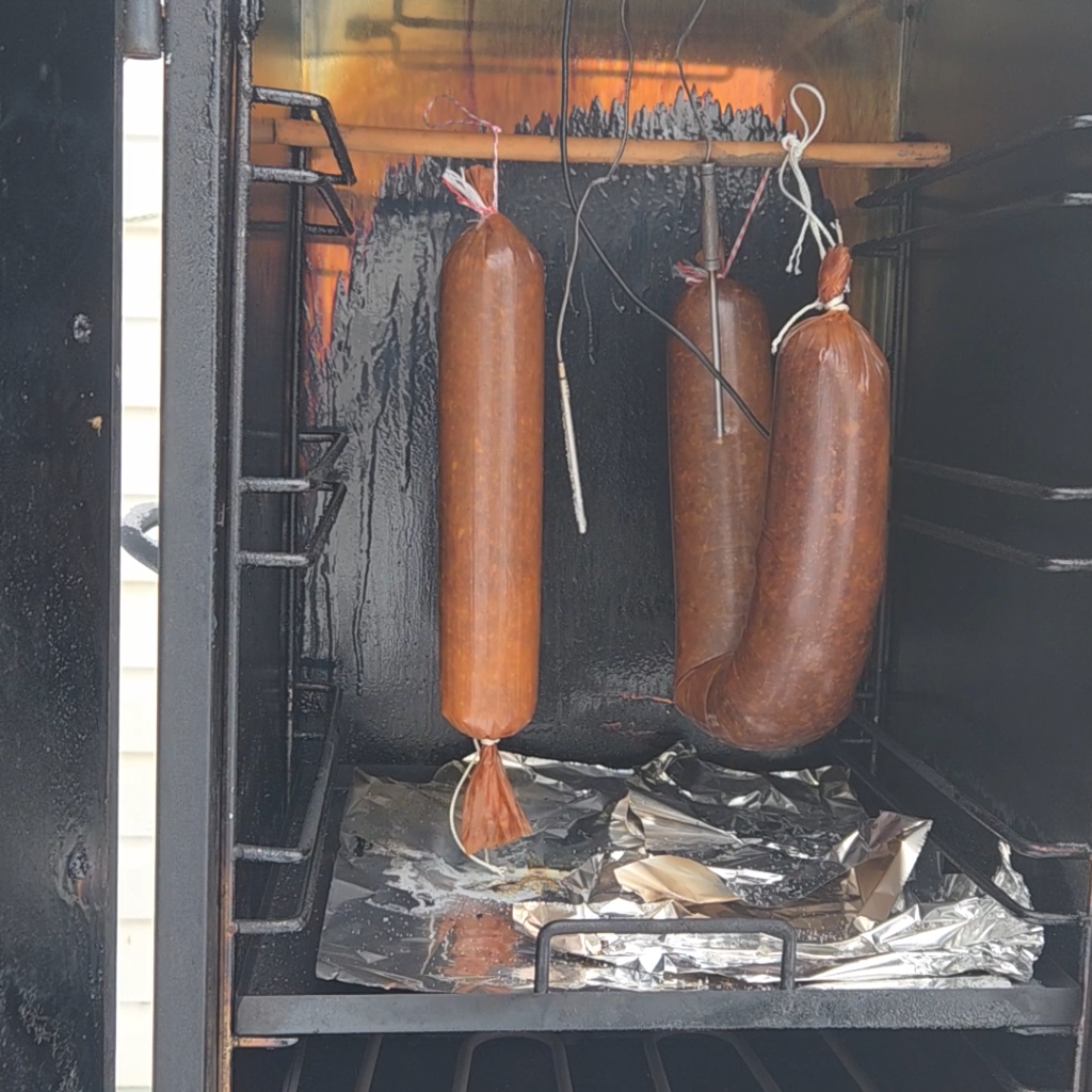 Salami in the smoker to dry