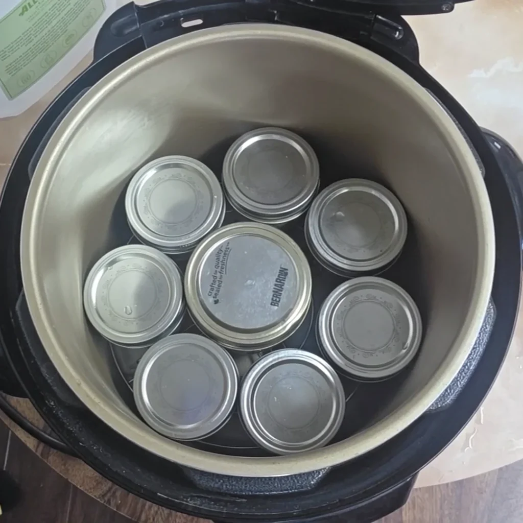 Jars of mustard in the canner
