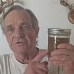 Pointing at a jar of French onion soup