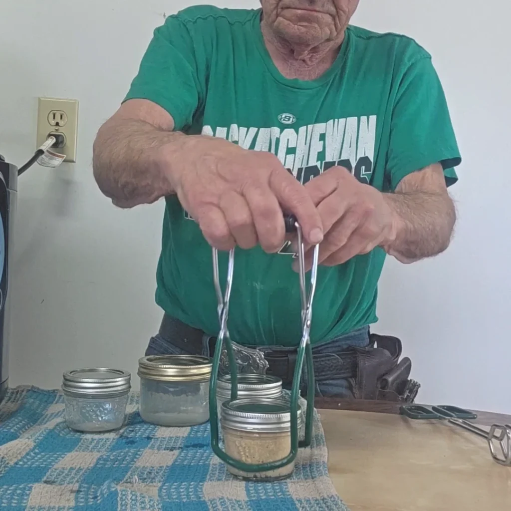 Pulling the  jars from the canner