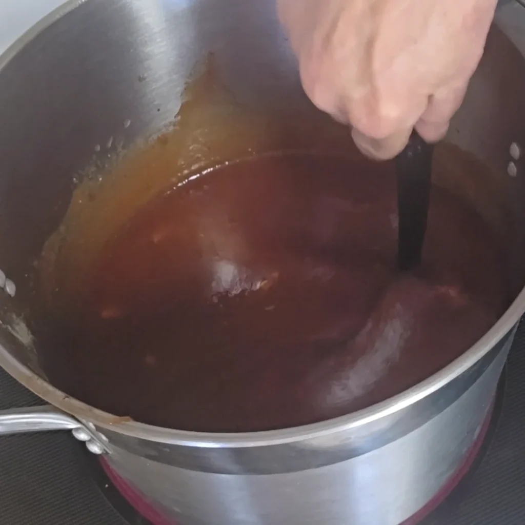 Stirring the BBQ sauce on the stove