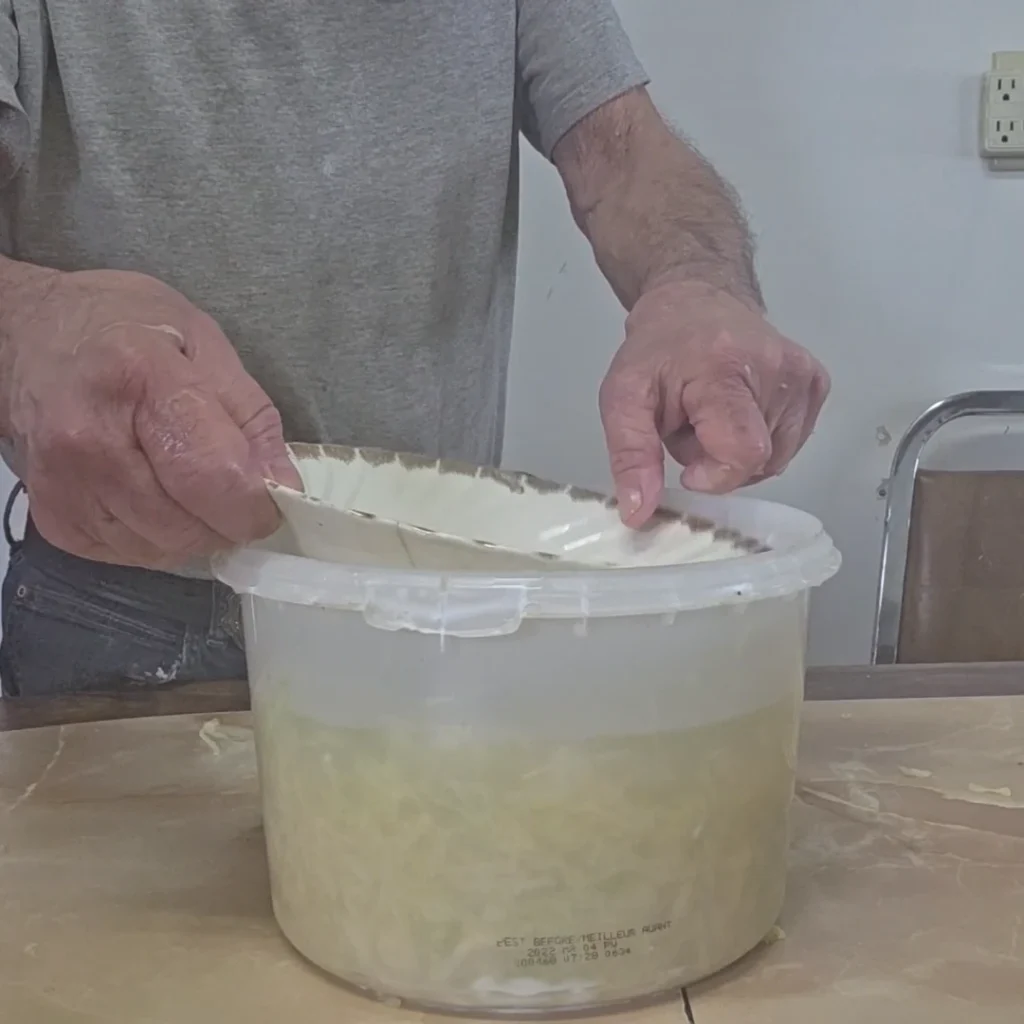 Weight the cabbage down
