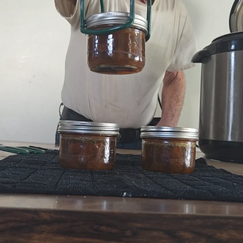 Pulling  the jars from the canner